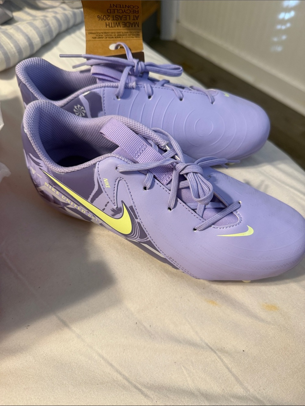 Nike Lilac Soccer Cleats with Neon Yellow Swoosh